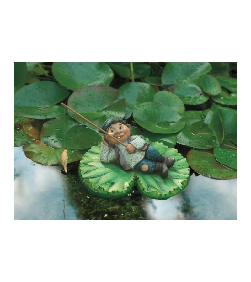 Kind liggend op een lelieblad drijffiguur